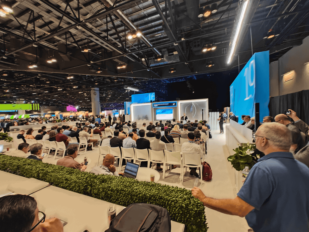 Packed audience at a migration session on one of the SAP Sapphire 2024 show floor stages